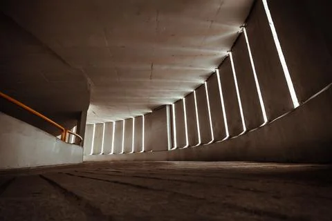 Perspective view of Curving shaped ramp on the high building for spiral indoo Stock Photos