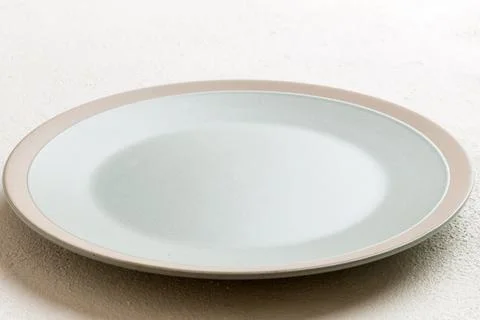 Perspective view of empty light plate on cement background. Empty space for.. Stock Photos