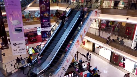A Perspective view of an Escalator with people in India. Stock Footage 278163393