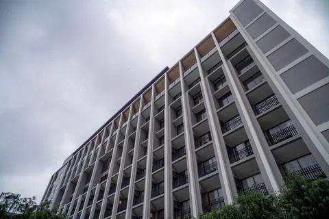 Perspective view of a facade of hotel building forming a pattern, as background Foto stock