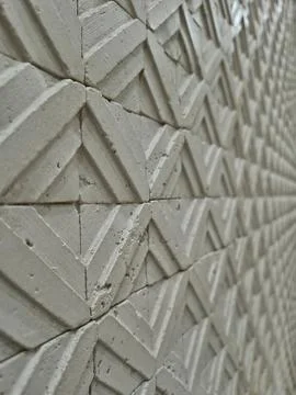 Perspective view of geometric 3D concrete wall texture Stock Photos