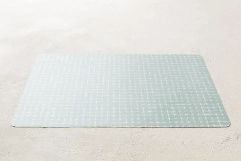 Perspective view of grey tablecloth for food on cement background. Empty spac Stock Photos