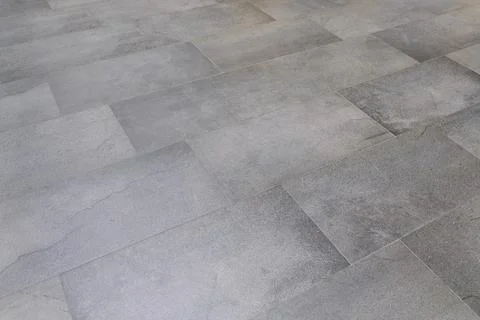 Perspective view of grey tile floor Stock Photos