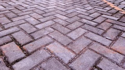 Perspective View of Herringbone Cobblestone Pavement Foto stock