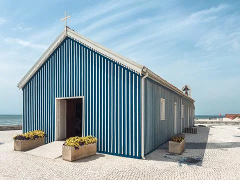 Perspective view of the iconic blue and white striped chapel of Praia de Mi.. 写真素材