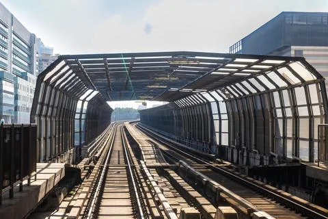 Perspective view of mass rail transit train passing through tracks with sound Photos