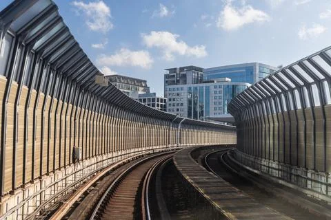 Perspective view of mass rail transit train passing through tracks with sound Stock Photos