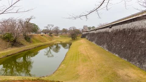 Perspective View of Moat and Wall of Castle Stock Photos