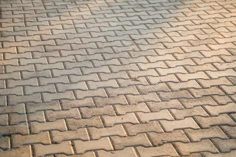 Perspective View Monotone Gray Brick Stone Pavement on The Ground for Street 写真素材