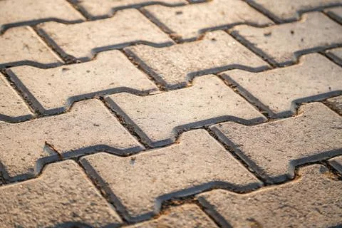 Perspective View Monotone Gray Brick Stone Pavement on The Ground for Street 写真素材