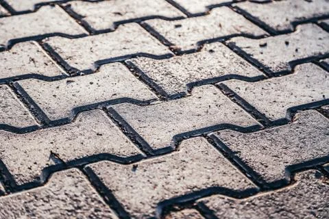 Perspective View Monotone Gray Brick Stone Pavement on The Ground for Street Stock Photos