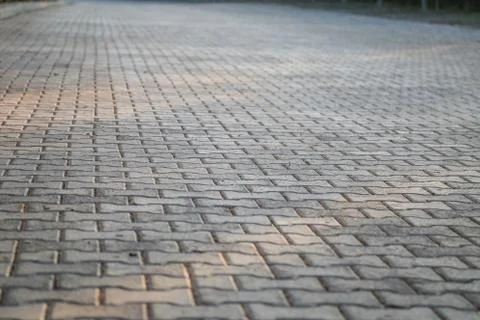 Perspective View Monotone Gray Brick Stone Pavement on The Ground for Street 写真素材