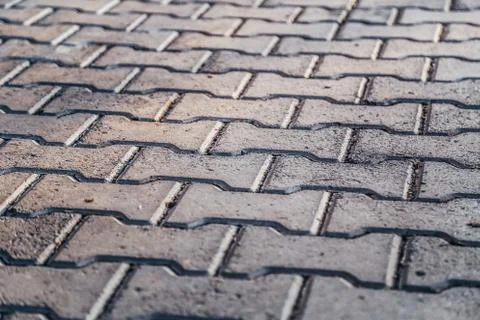 Perspective View Monotone Gray Brick Stone Pavement on The Ground for Street 写真素材