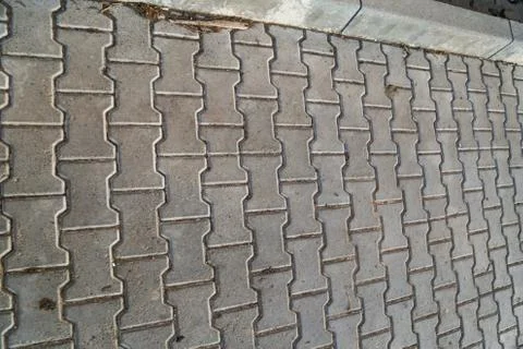 Perspective View Monotone Gray Brick Stone Pavement on The Ground for Street Stock Photos