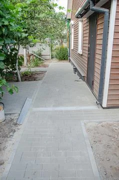 Perspective View Monotone Gray Brick Stone Pavement on The Ground for Street  Stock Photos