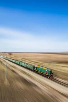 Perspective view of moving train with Russian flag Stock Photos
