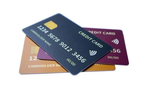 Perspective view of overlapping multi-colored credit and debit cards on a w.. Stock Photos
