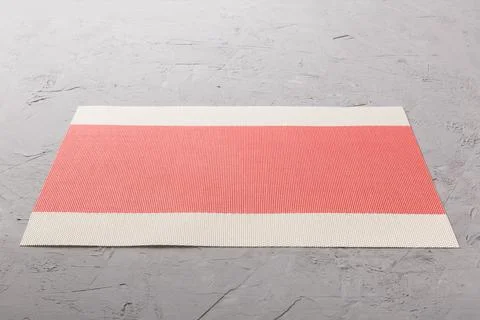 Perspective view of red tablecloth for food on cement background. Empty space Stock Photos