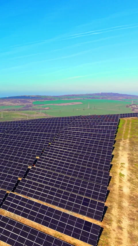 Perspective view of solar panels rows on hill Vertical video. Stock Footage 332347229