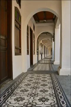 Perspective view of a tiled corridor. Stock Photos