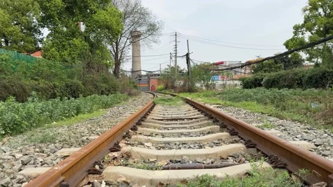 Perspective view of traditional railway infrastructure in rural China Vídeos de archivo 334700680