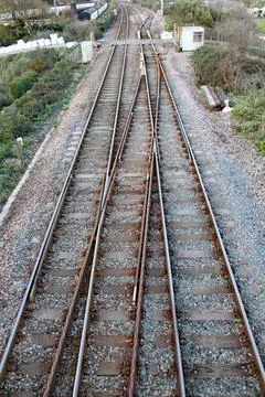 Perspective view of two railway tracks and points to interchange between trac Stock Photos