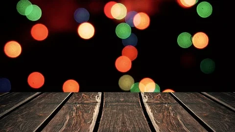Perspective wood and bokeh background of night and the shimmering glare of the Stock Footage 77407703