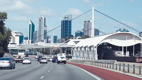 Perth, Australia - September 11, 2023: Busy road leading to downtown Perth .. Stock Footage 303869533