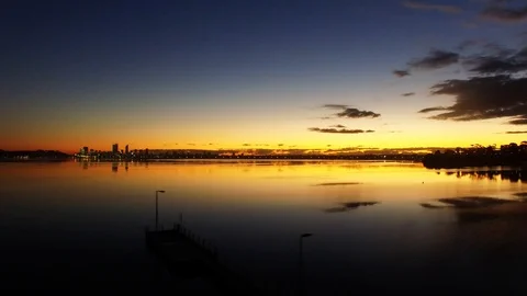 Perth city skyline sunrise river aerial tracking footage Stock Footage