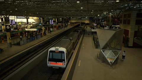 Perth train waits for passengers to board in the city 6K Video stock 312188429