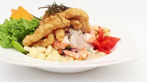 Peru Dish: Cebiche (Ceviche) and "chicharron" with onion, called "Caretillero" Stock Footage 50424759