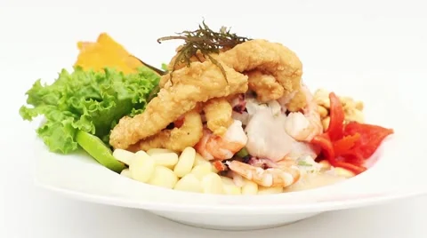 Peru Dish: Cebiche (Ceviche) and "chicharron" with onion, called "Caretillero" Stock Footage 50424760