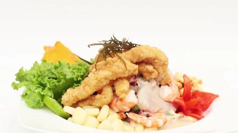 Peru Dish: Cebiche (Ceviche) and "chicharron" with onion, called "Caretillero" Stock Footage 50424766