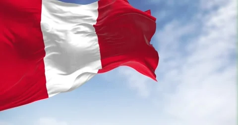 Peru national flag waving in the wind on a clear day Stock Footage 250106601