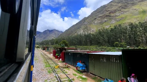 Peru Rail train Urubamba river buildings Machu Picchu Inca Trail Aguas Stock Footage 325971604