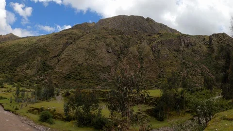 Peru TIME LAPSE Time Lapse Over River Onto Mountain with Clouds and Water Stock Footage 128203573