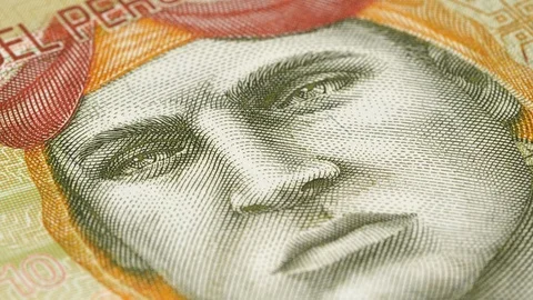 Peruvian 10 soles banknote (2009) rotating. Currency of Peru. Low angle, 4K Stock Footage 124372779