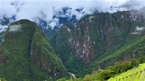 Peruvian Andes mountain range Machu Pichhu Inca Citadel circuit trail terrace Stock Footage 325759296