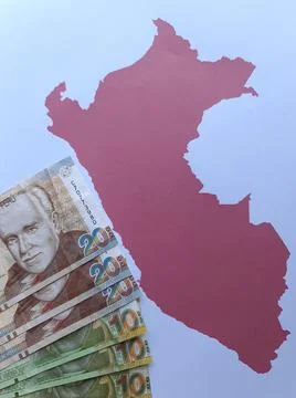 Peruvian banknotes and background with Peru map silhouette Stock Photos