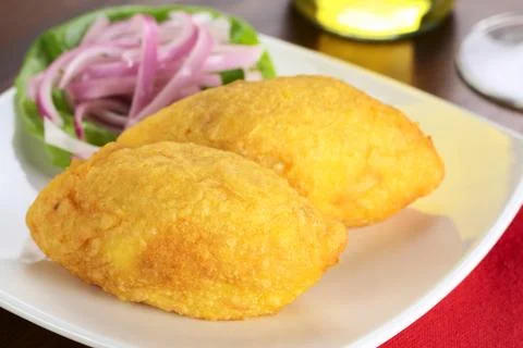 Peruvian dish called papa rellena Stock Photos