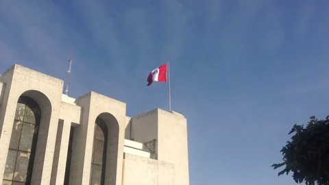 Peruvian flag on the building of justice. Stock Footage 79013504