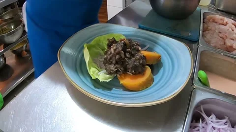 Peruvian food BLACK SHELLS CEVICHE, served on restaurant plates. Video stock 171408889
