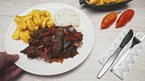 Peruvian Lomo Saltado Dish with Beef Fries and Rice Vídeo Stock 338341657