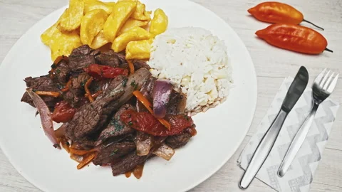 Peruvian Lomo Saltado Dish with Beef Fries and Rice Stock Footage 341439278