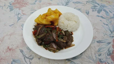 Peruvian Lomo Saltado Dish with Beef Fries and Rice Video stock 341439291