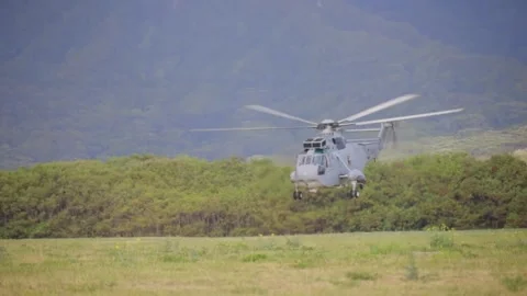 Peruvian Navy Agusta SH-3D Sea King helicopter taking off during air assault Stock Footage 280385682