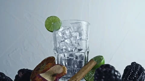Peruvian purple Corn Drink Chicha Morada Ingredients with Ice and Lime Stock Footage 335893725