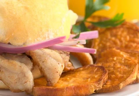 Peruvian sandwich called pan con chicharron Stock Photos
