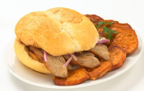 Peruvian sandwich called pan con chicharron Stock Photos