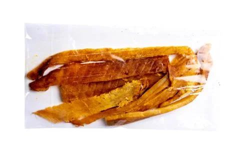 Peruvian squid in a transparent package isolated on white background. Snack o Stock Photos